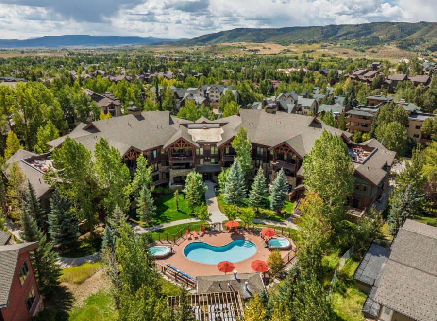 Discover luxury living in this stunning property, featuring a beautiful pool and spa area perfect for relaxation.