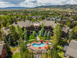 Discover luxury living in this stunning property, featuring a beautiful pool and spa area perfect for relaxation.