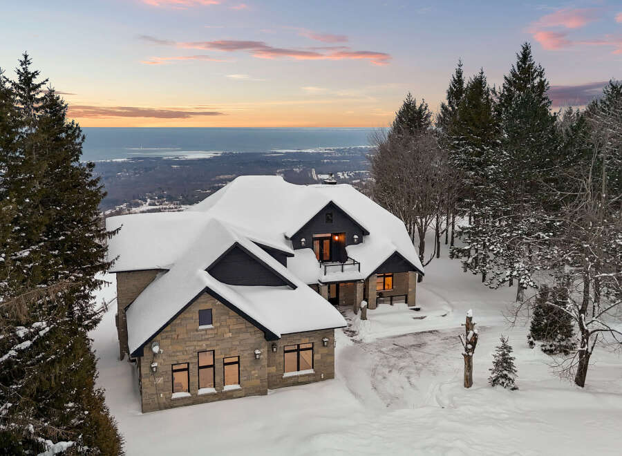 This stunning property offers a luxurious living experience with breathtaking views.