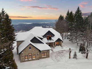 This stunning property offers a luxurious living experience with breathtaking views.