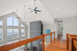 This stunning property boasts a modern interior with high ceilings and expansive windows that flood the space with natural light.