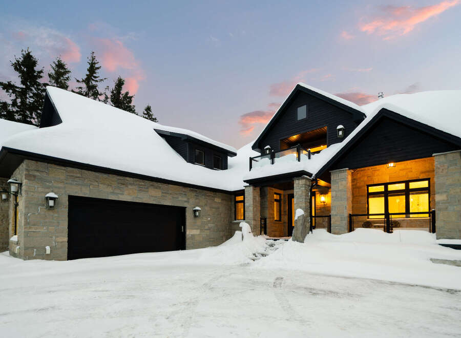 This stunning property showcases a luxurious home with a modern design.