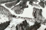 Nestled in a winter wonderland, this property offers a unique blend of natural beauty and recreational opportunities.