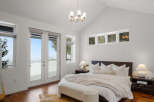 Experience luxury in this stunning bedroom featuring a modern design and ample natural light.