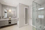 Step into luxury with this stunning bathroom, featuring a sleek, modern design.