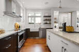 Step into a modern kitchen designed for both style and functionality.