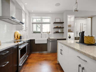 Step into a modern kitchen designed for both style and functionality.