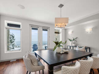 Experience luxury living in this stunning dining room, perfect for hosting memorable gatherings.
