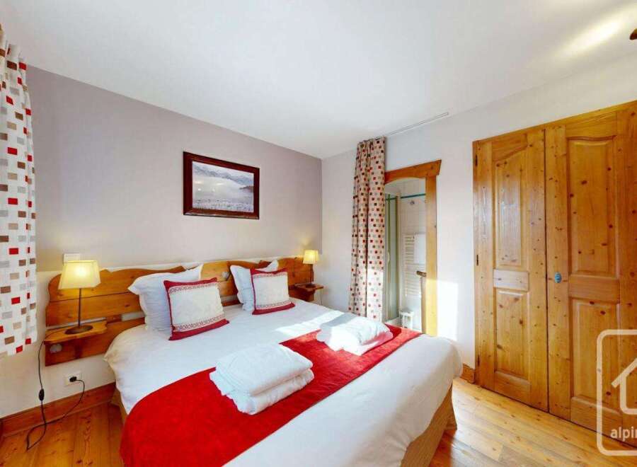 Discover the charm of this cozy bedroom, perfect for a relaxing getaway.