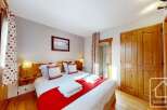 Discover the charm of this cozy bedroom, perfect for a relaxing getaway.