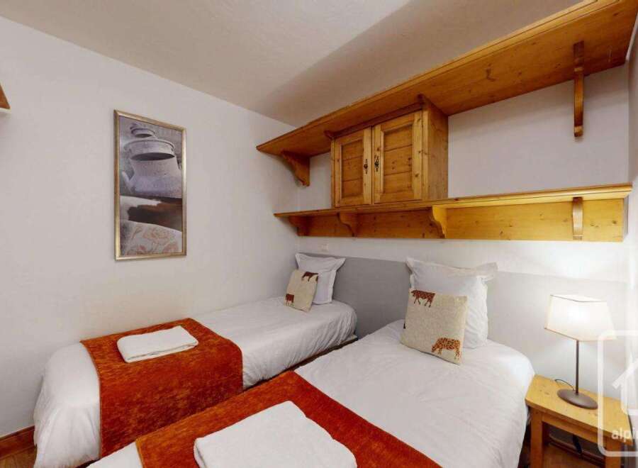 Discover the charm of this cozy bedroom, perfect for a relaxing getaway.