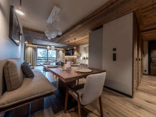 Experience luxury living in this stunning property, featuring a beautifully designed dining area perfect for entertaining.