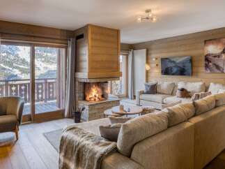 Experience the ultimate in luxury living with this stunning property featuring a cozy fireplace and breathtaking mountain views.
