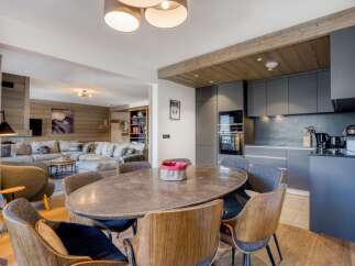 Experience luxury living in this stunning property, featuring a modern kitchen with sleek cabinetry and top-of-the-line appliances.