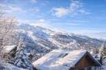 Nestled in a picturesque winter wonderland, this charming property offers stunning mountain views.