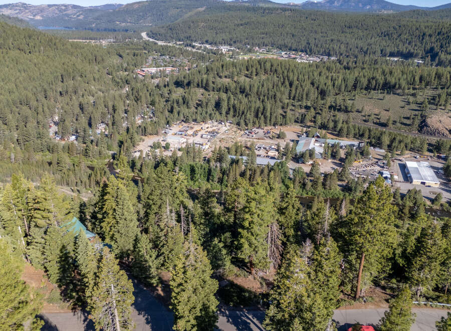 Nestled amidst a lush, green forest, this property offers a serene escape with stunning natural views.