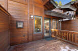 This stunning property boasts a beautiful wooden exterior, creating a warm and inviting atmosphere.