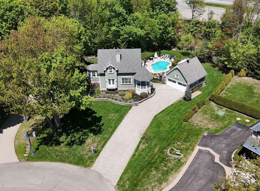 This stunning property boasts a beautiful home with a pool, perfect for relaxation and entertaining.