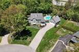This stunning property boasts a beautiful home with a pool, perfect for relaxation and entertaining.