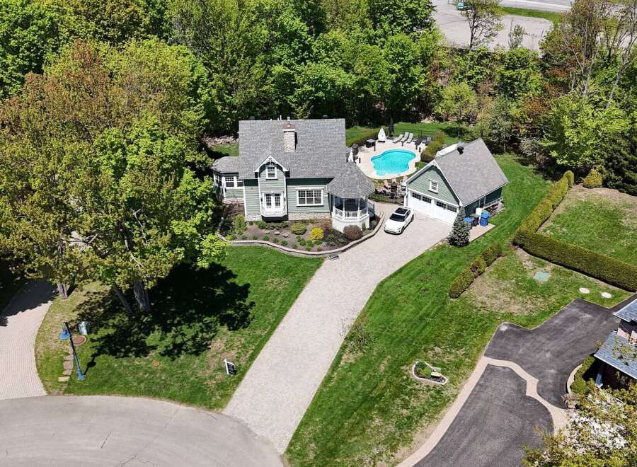 This stunning property boasts a beautiful home with a pool, perfect for relaxation and entertaining.