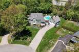 This stunning property boasts a beautiful home with a pool, perfect for relaxation and entertaining.