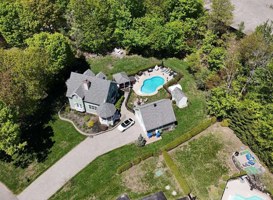 Discover your dream home with this stunning property! This luxurious estate boasts a beautiful pool, perfect for relaxing and entertaining.