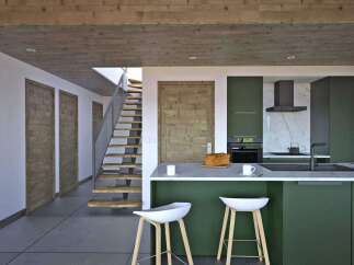 Step into modern elegance with this stunning kitchen design.