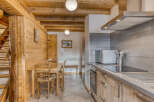 Step into this charming kitchen, featuring a rustic wooden design that exudes warmth and character.