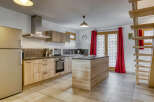 This stunning kitchen boasts modern design and functionality, perfect for culinary enthusiasts.