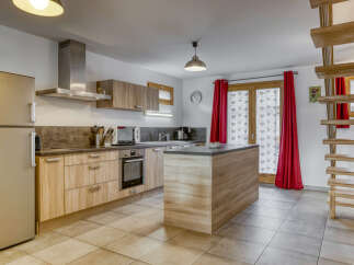 This stunning kitchen boasts modern design and functionality, perfect for culinary enthusiasts.