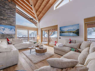 Experience luxury living in this stunning chalet, boasting breathtaking mountain views and a cozy, inviting atmosphere.