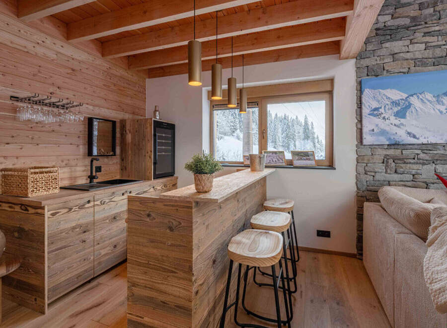 This stunning property boasts a rustic, yet modern design, perfect for those seeking a cozy retreat.