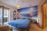 Experience the ultimate in alpine luxury with this stunning bedroom.