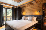 Experience luxury and comfort in this stunning bedroom.