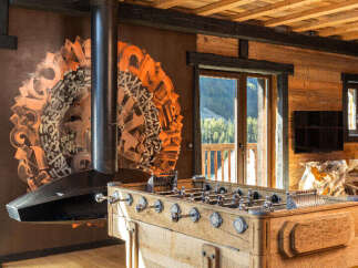 This stunning property boasts a unique blend of rustic charm and modern design.
