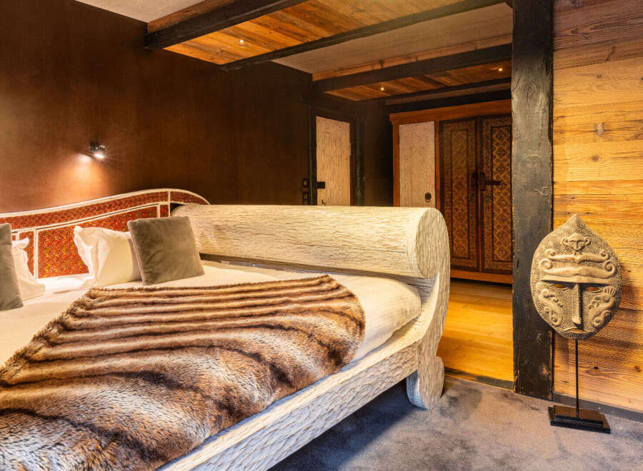 Experience rustic elegance in this stunning bedroom.