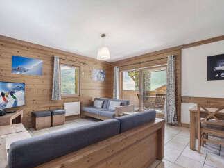 Discover the charm of this cozy living space, perfect for a mountain getaway.