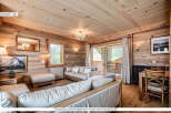 Step into a cozy and inviting living space with stunning wooden accents.