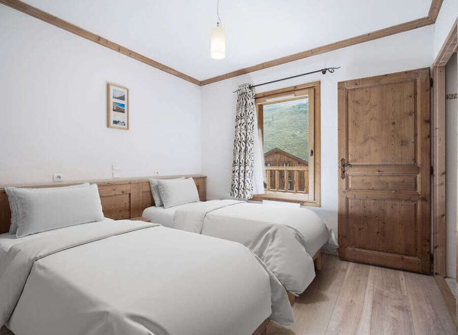 Discover the charm of this cozy bedroom, perfect for a relaxing getaway.