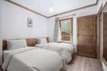 Discover the charm of this cozy bedroom, perfect for a relaxing getaway.
