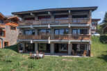 Experience mountain living in this stunning property featuring multiple levels of balconies with picturesque views.