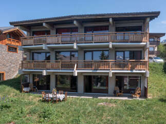 Experience mountain living in this stunning property featuring multiple levels of balconies with picturesque views.