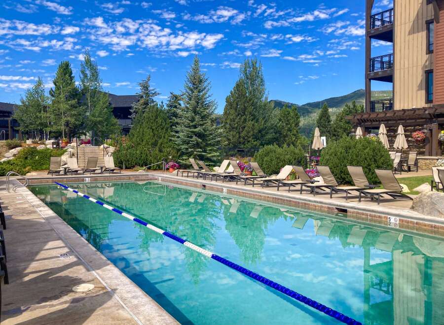 Enjoy a luxurious stay at this stunning property, featuring a beautiful outdoor pool perfect for relaxation.