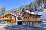 Discover the epitome of luxury living in this stunning chalet nestled in a winter wonderland.