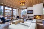Experience luxury living in this stunning property featuring a cozy fireplace, perfect for chilly evenings.