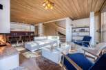 Experience luxury living in this stunning property featuring a cozy fireplace and a modern, open-plan design.