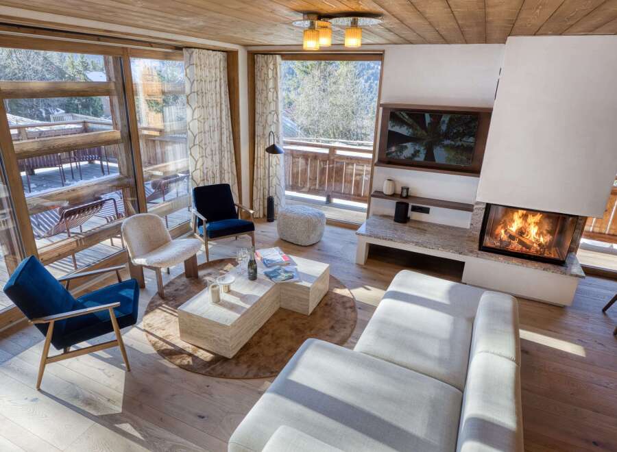 Experience luxury living in this stunning property featuring a cozy fireplace, perfect for chilly evenings.