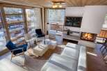 Experience luxury living in this stunning property featuring a cozy fireplace, perfect for chilly evenings.