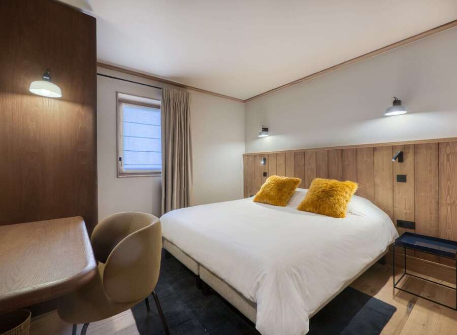 Experience the epitome of comfort in this beautifully designed bedroom.