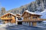 Discover the epitome of luxury living in this stunning chalet nestled in a winter wonderland.
